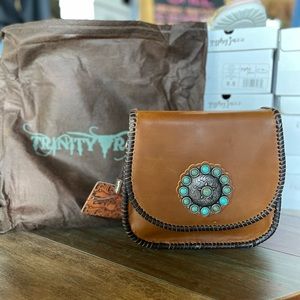 Trinity Ranch real leather shoulder bag. NWT, has minor flaws (pictured)